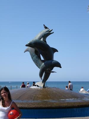 Delfines y mamá guapa